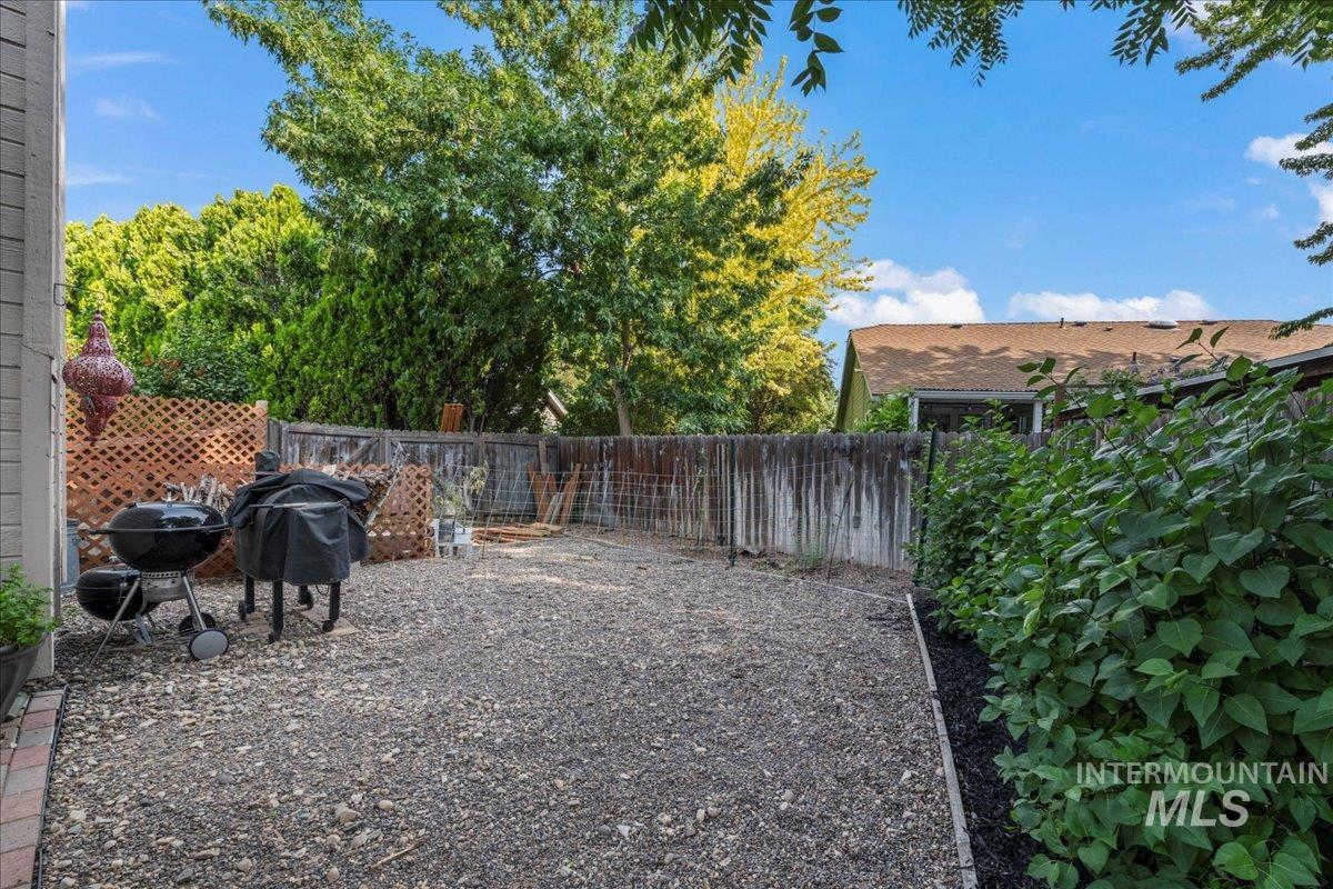 View of fenced backyard