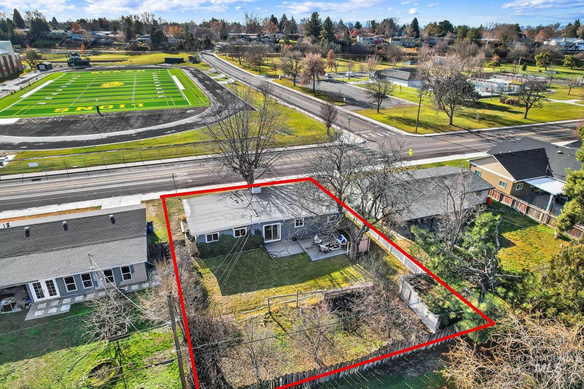 Aerial overview of property's location with property parcel outlined