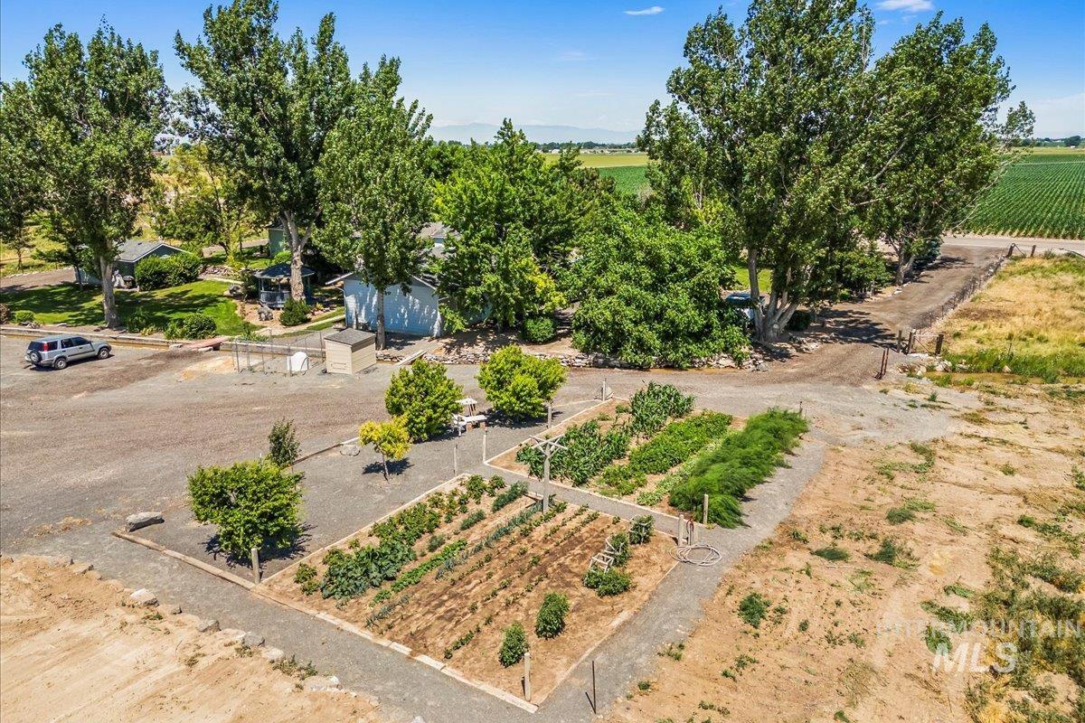 Aerial view of sparsely populated area featuring extensive farmland