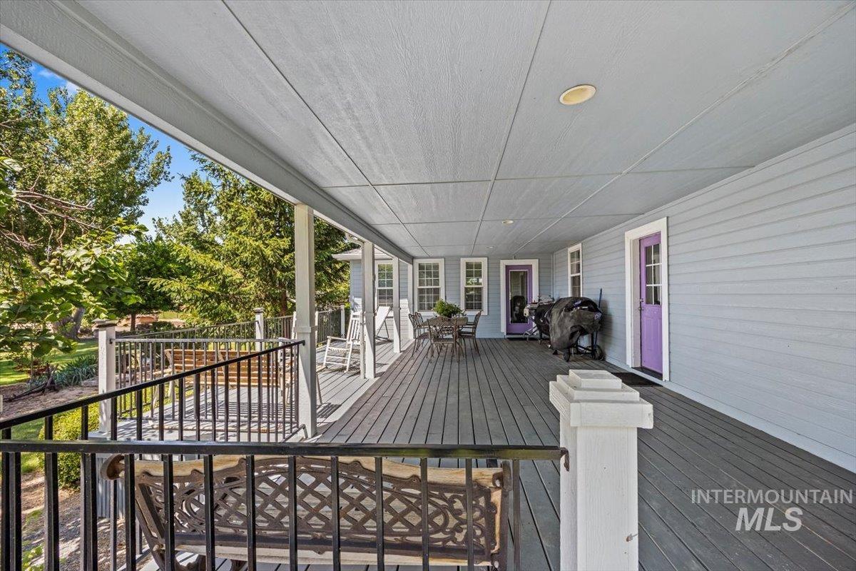 Wooden terrace with outdoor dining area