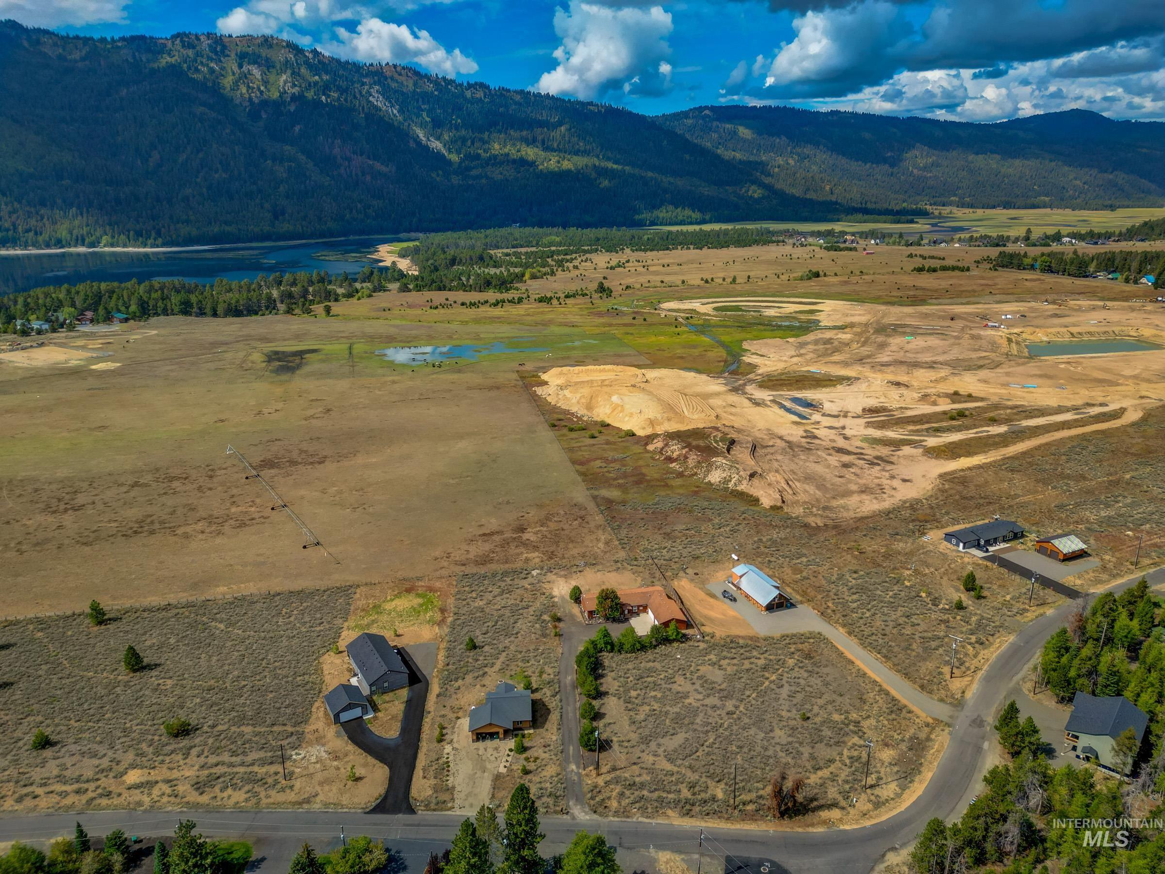 View of property location with a water and mountain view and rural landscape