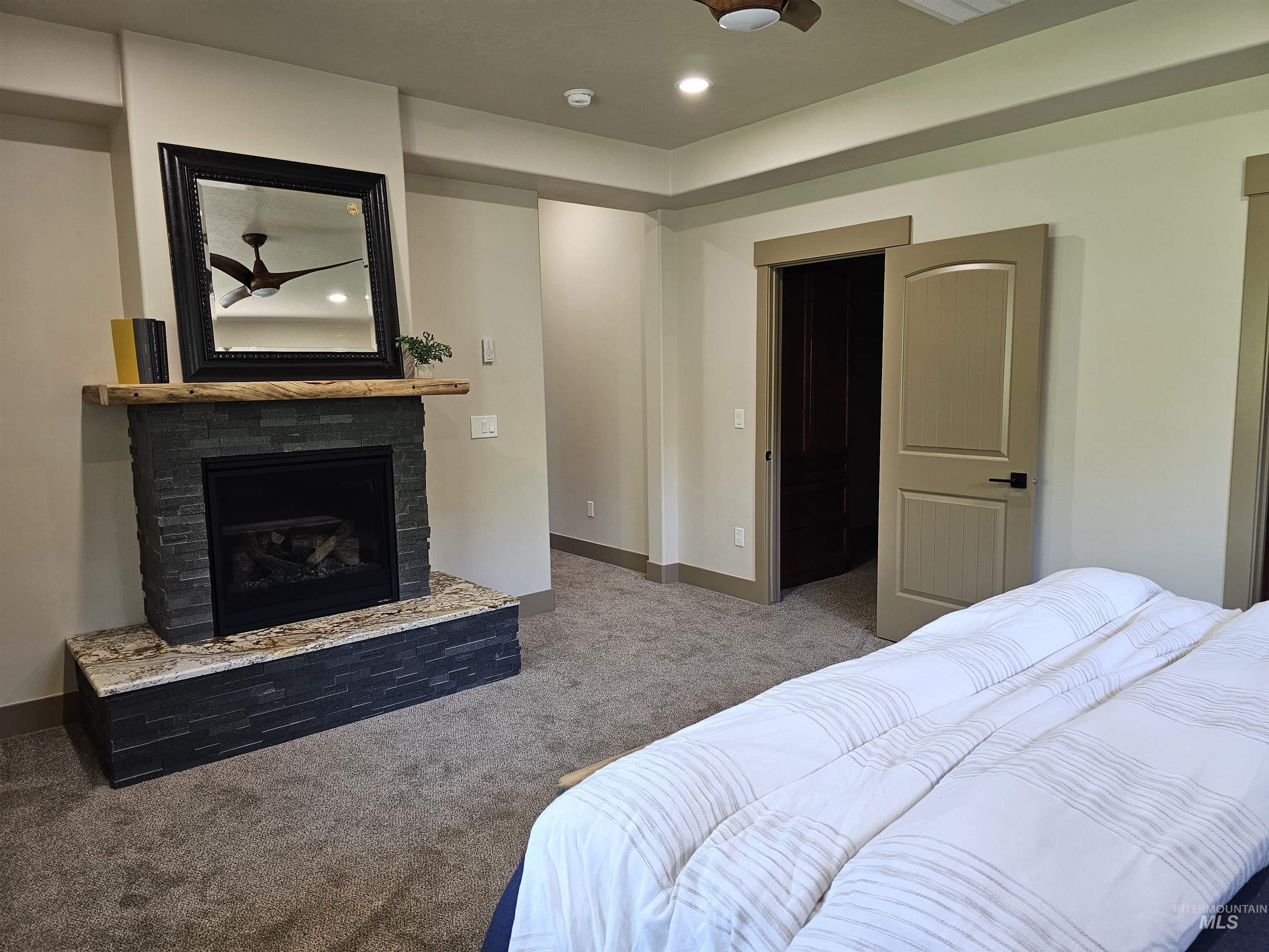 Bedroom has a propane fireplace to keep the room cozy on those cold winter evenings.