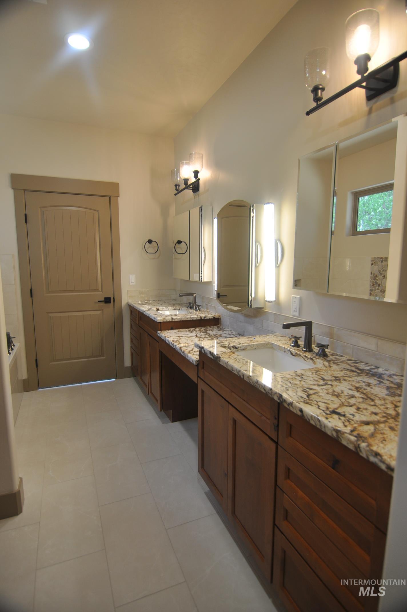 Alder cabinets and granite countertops.