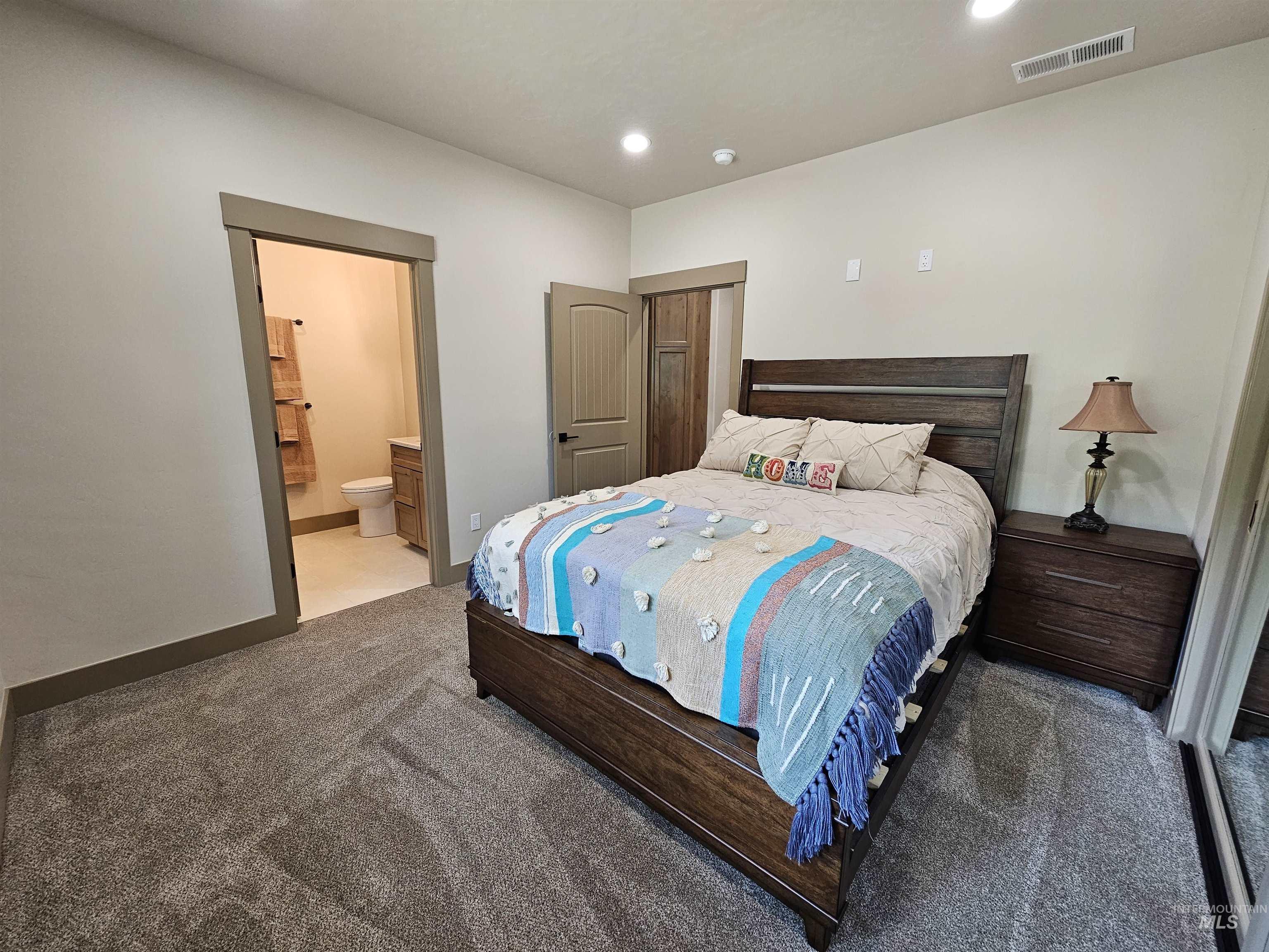 2nd bedroom with four piece ensuite bathroom.