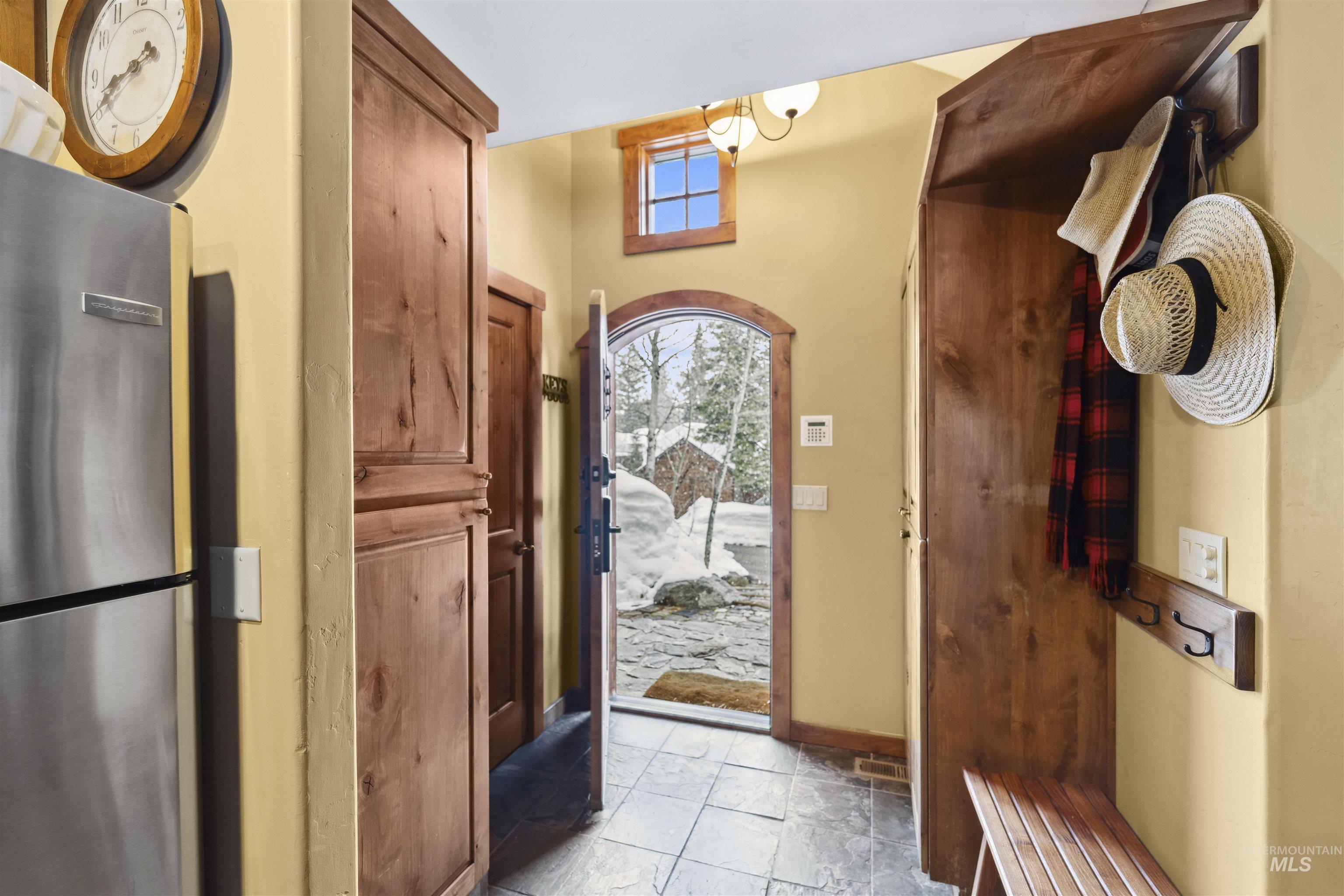 Entrance foyer featuring baseboards
