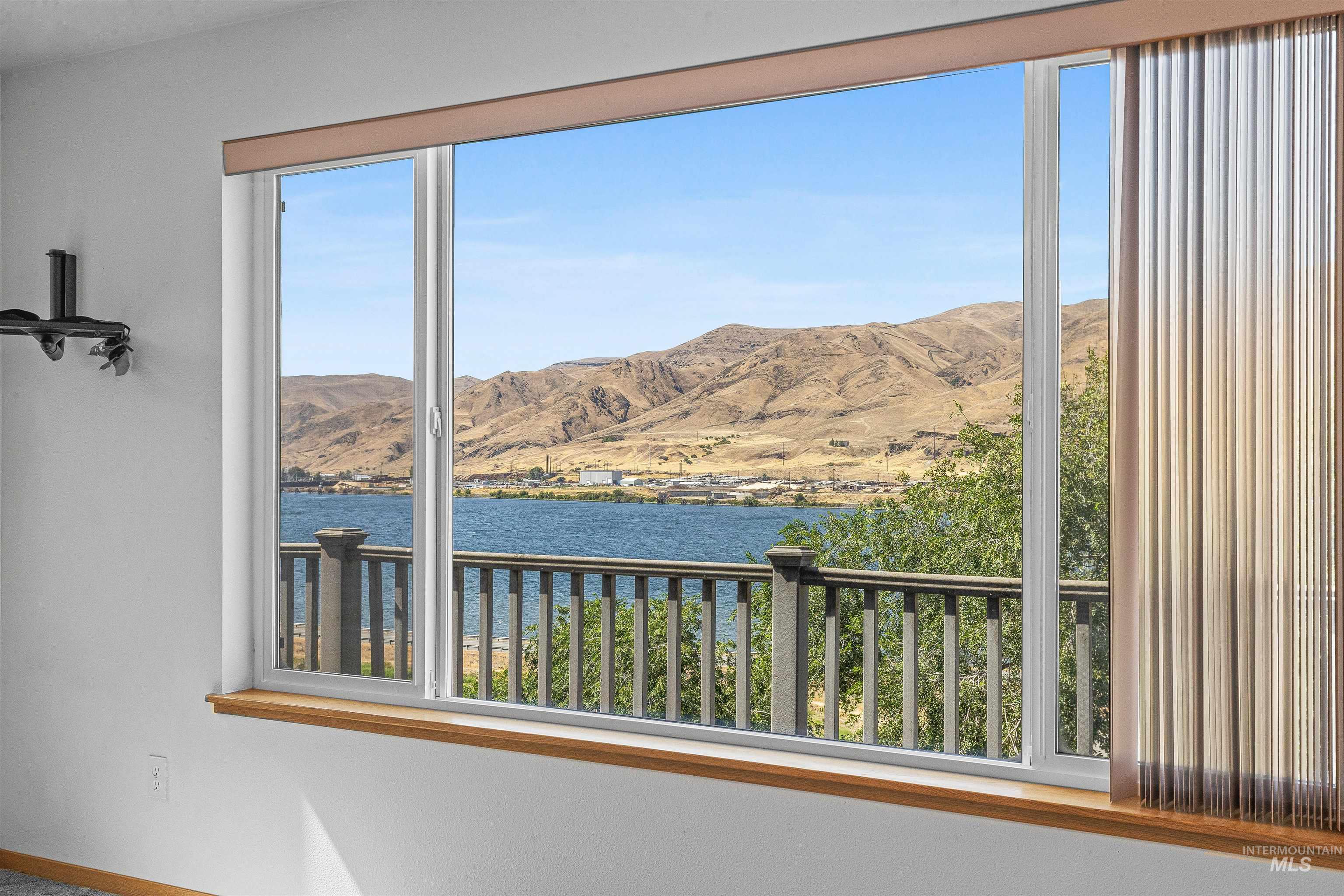 View of mountain background with a nearby body of water