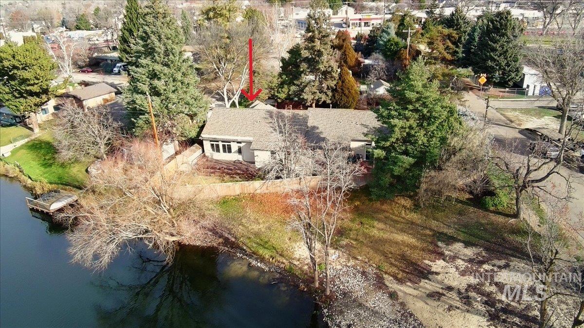 View of subject property featuring a large body of water