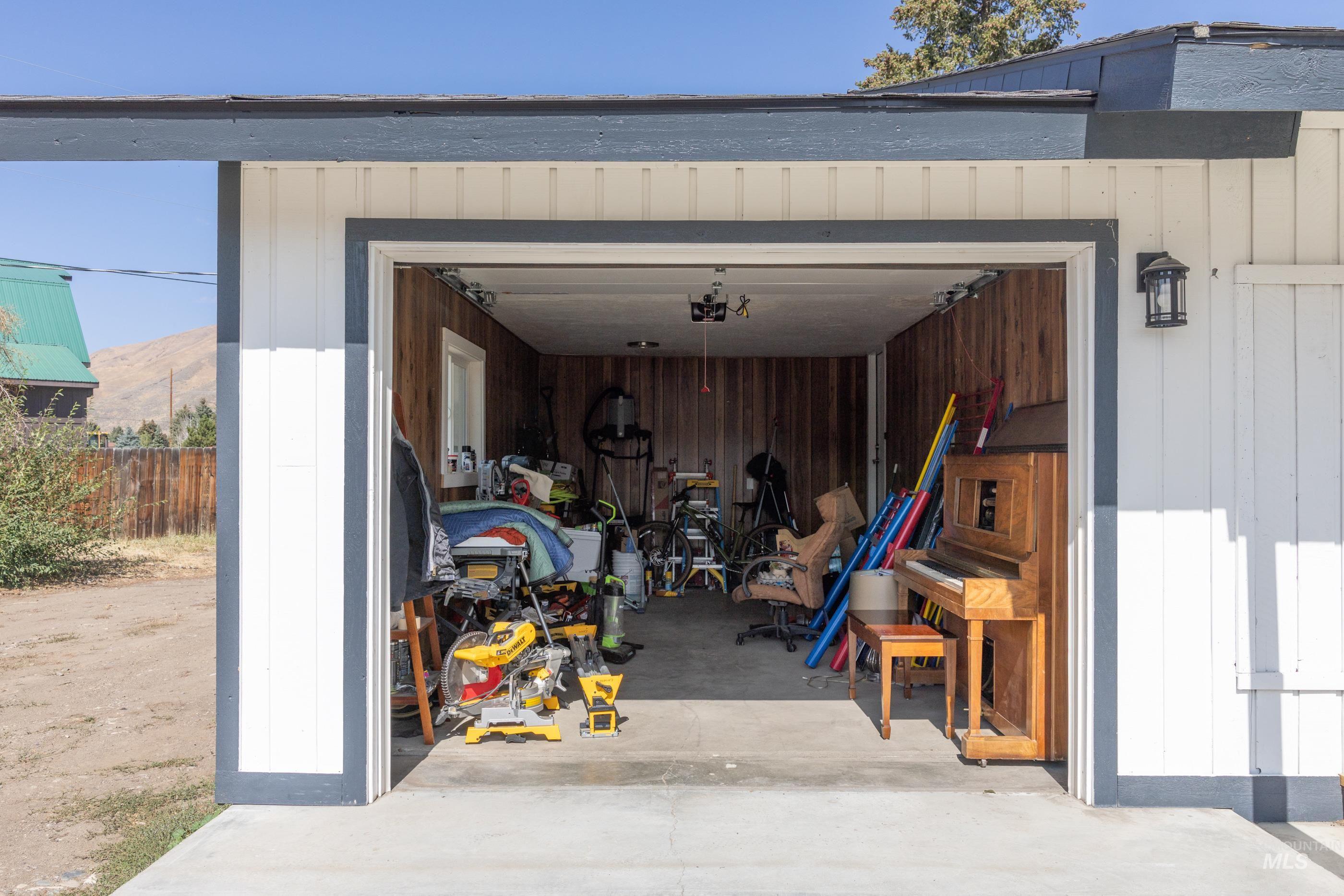 Garage featuring a mountain view