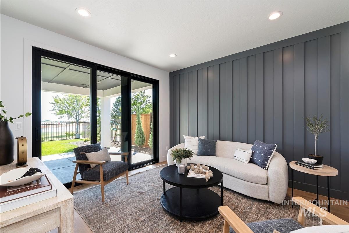 Living area featuring recessed lighting and wood finished floors