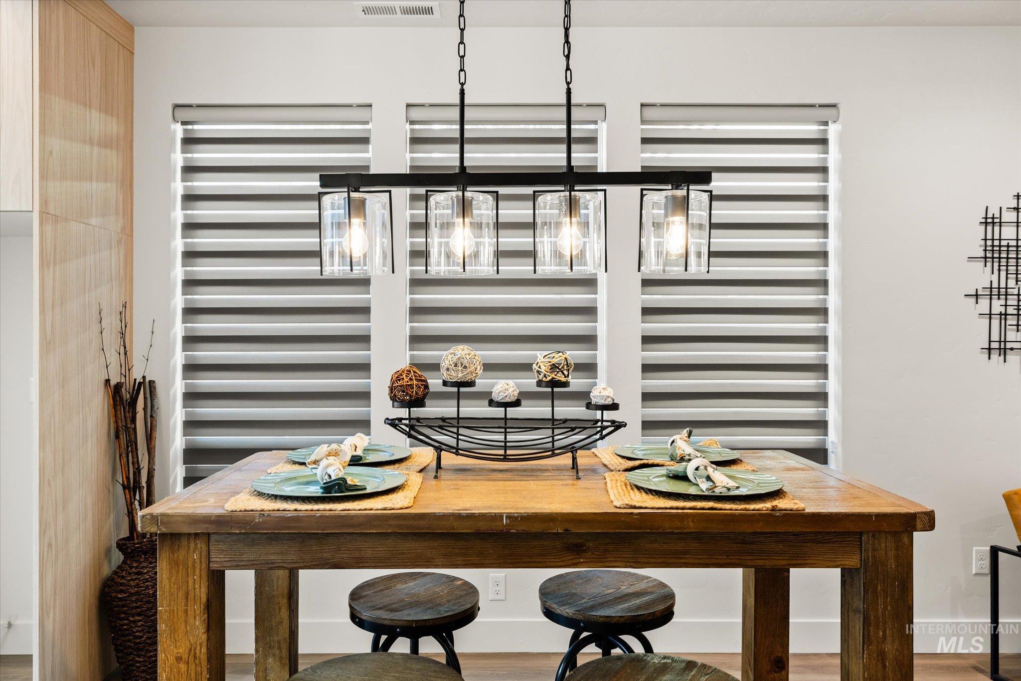 Dining room featuring wood finished floors