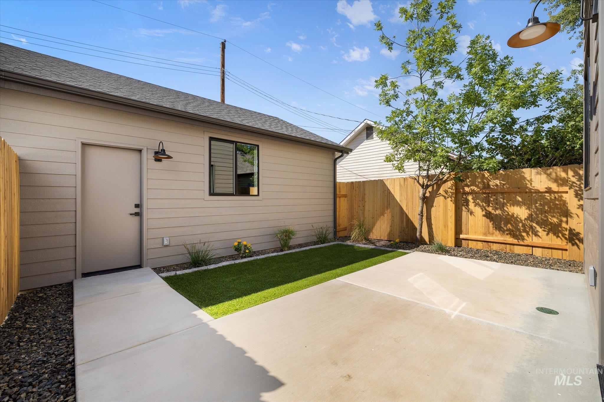 View of fenced backyard