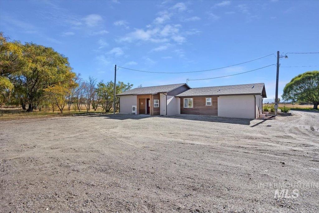 Photo of 410 N 400 E, Rupert, ID 83350 (MLS # 98965467)