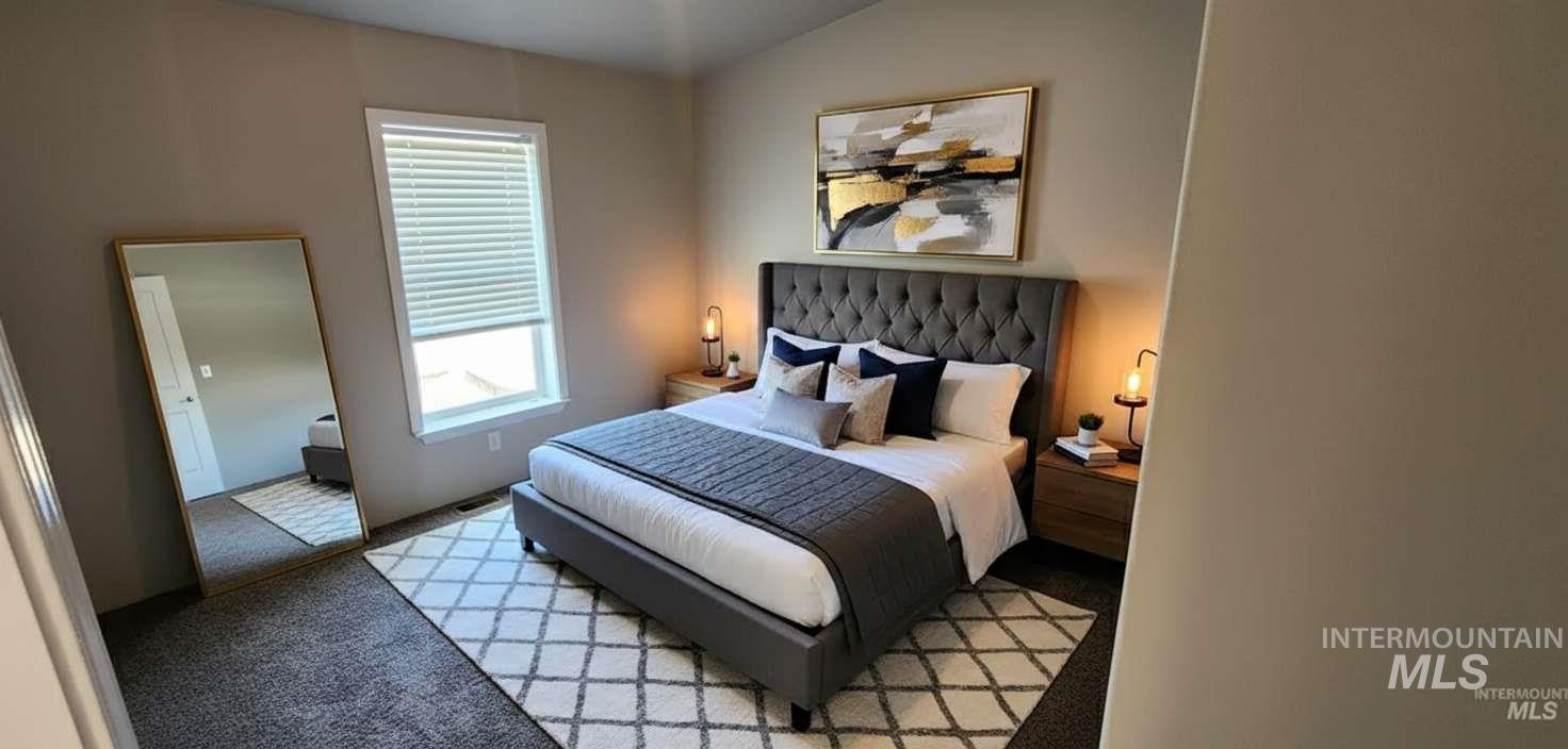 View of carpeted bedroom