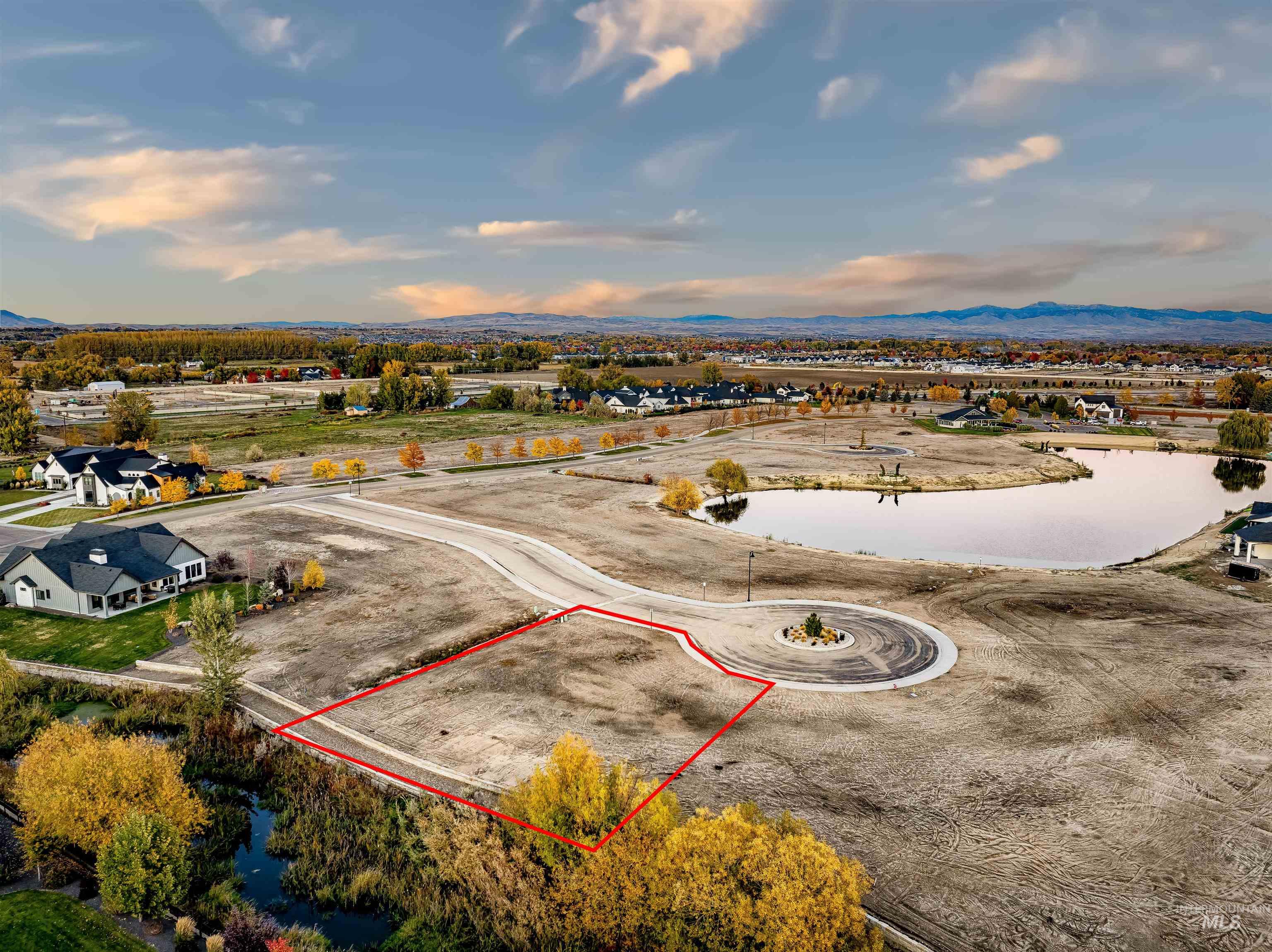View of property location featuring a water and mountain view and property boundaries highlighted
