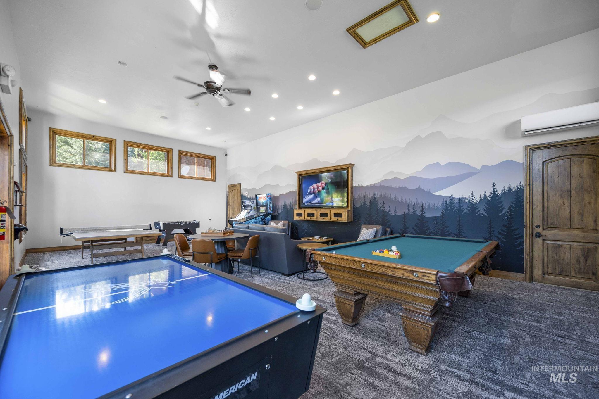 Game room with an AC wall unit, recessed lighting, dark carpet, billiards table, and a ceiling fan