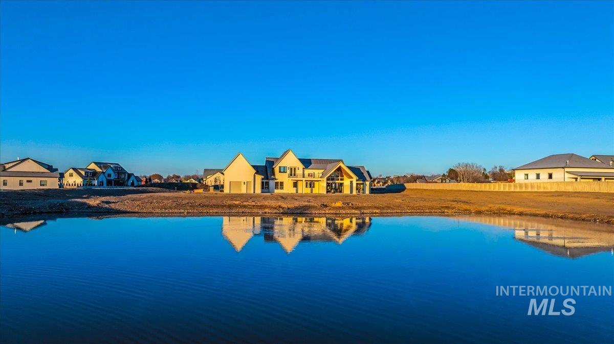 Water view with nearby suburban area