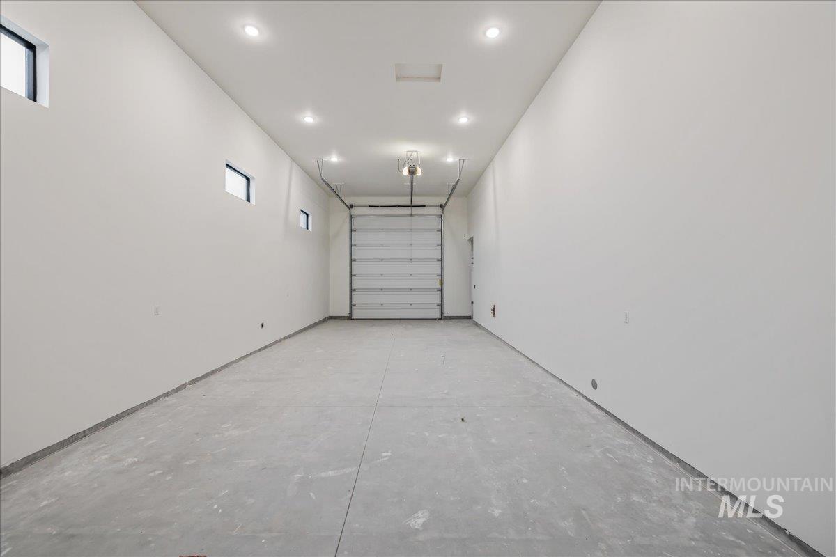 Garage featuring recessed lighting