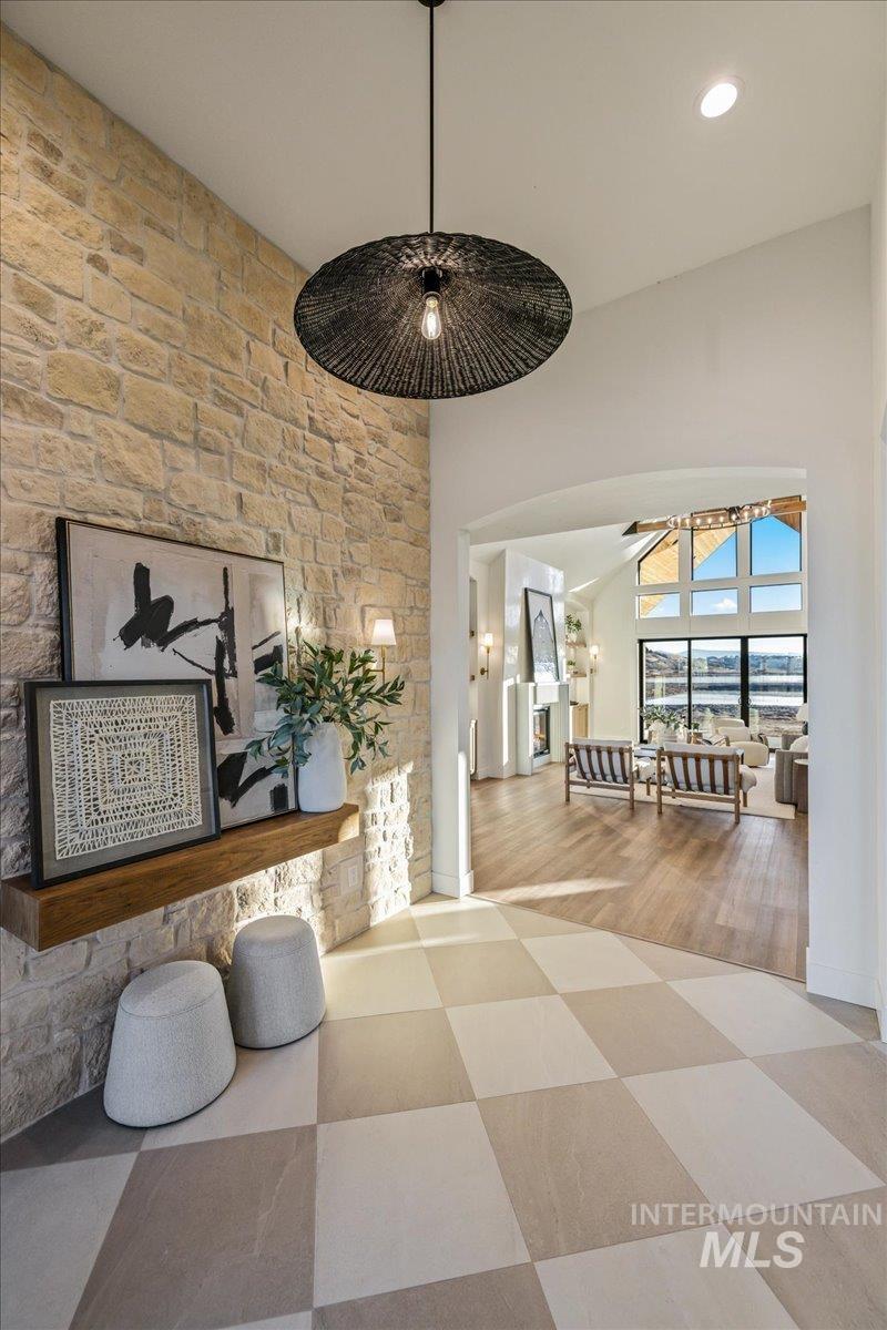 Corridor featuring tile patterned floors