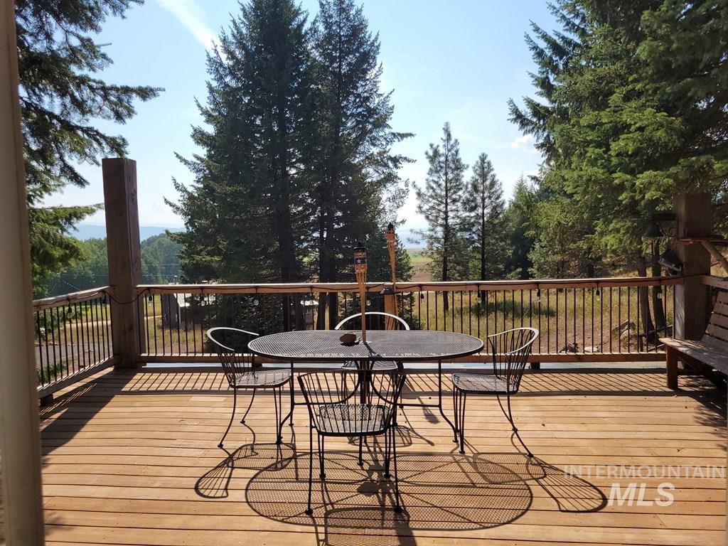 Wooden terrace with outdoor dining space