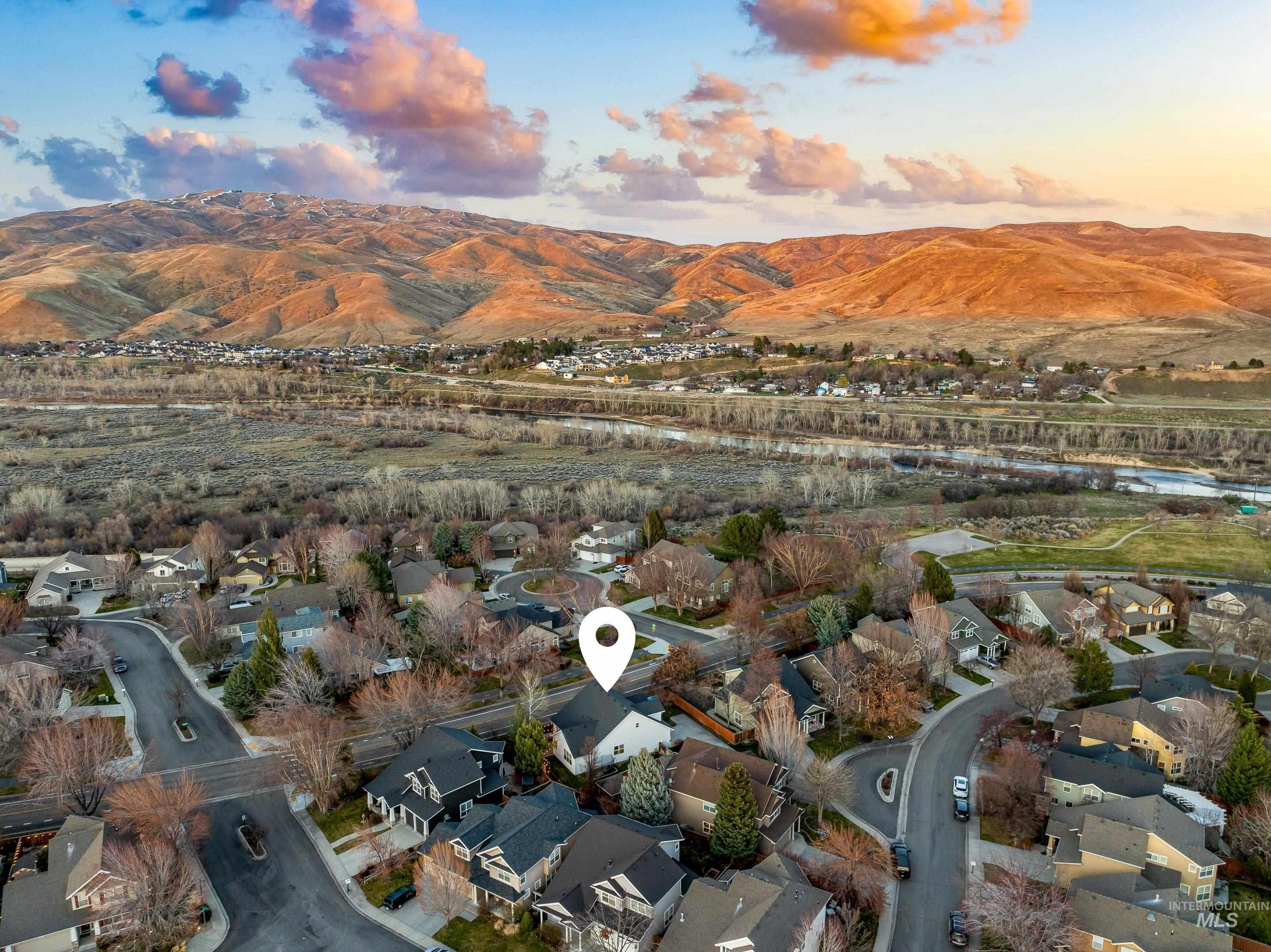 Aerial perspective of suburban area featuring mountains