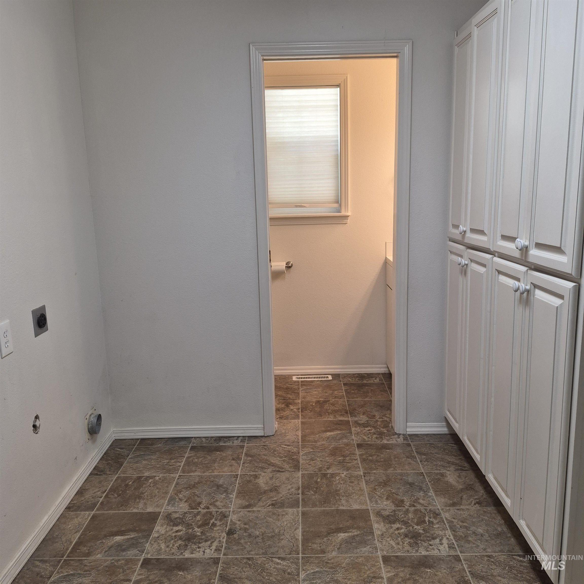 Laundry storage plus a half bath