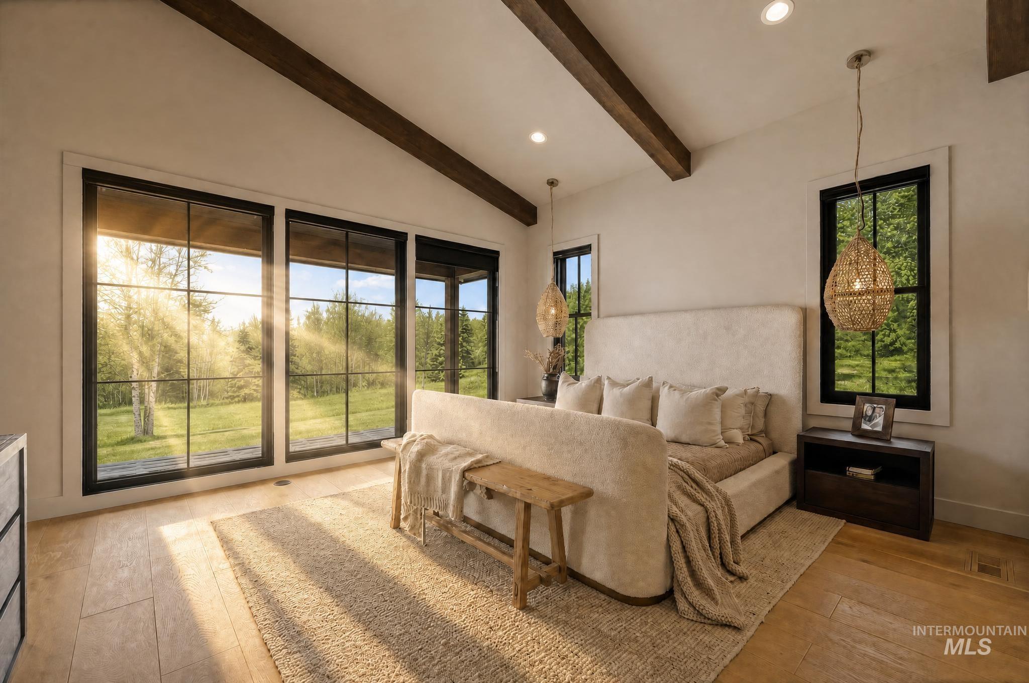 Vaulted ceiling with exposed wood beams, light wood-finish flooring, and large picture windows with black trim