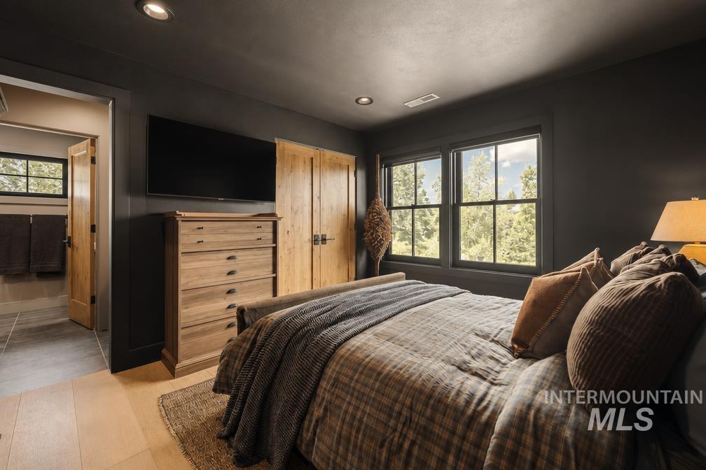Room featuring dark painted walls and recessed ceiling lighting