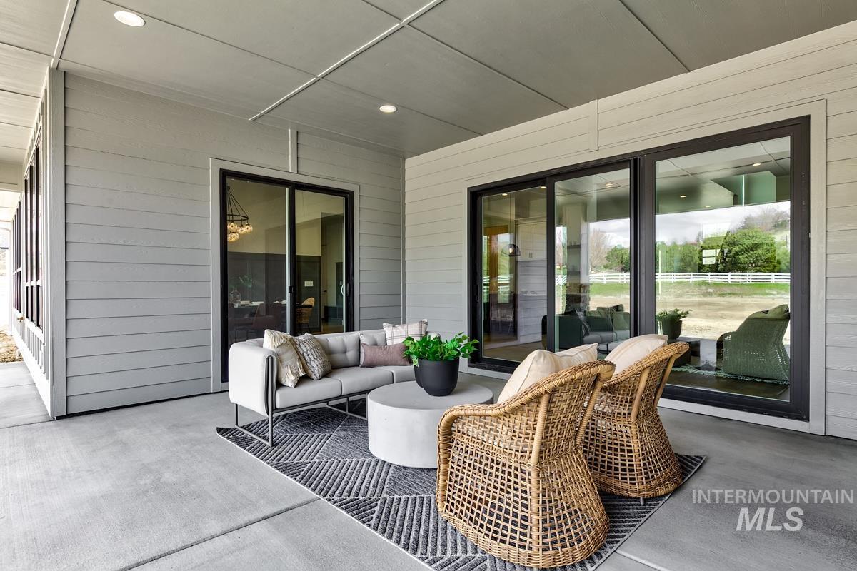 View of patio with an outdoor living space