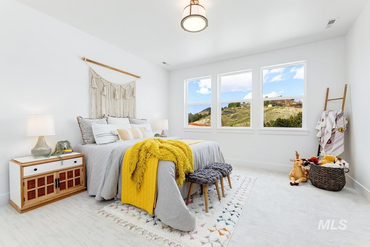 Bedroom featuring baseboards