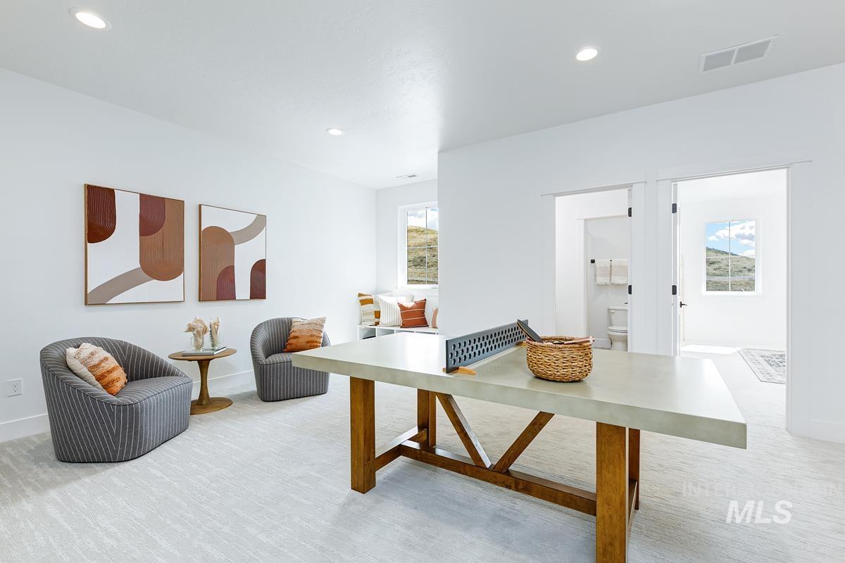 Game room featuring light colored carpet and recessed lighting