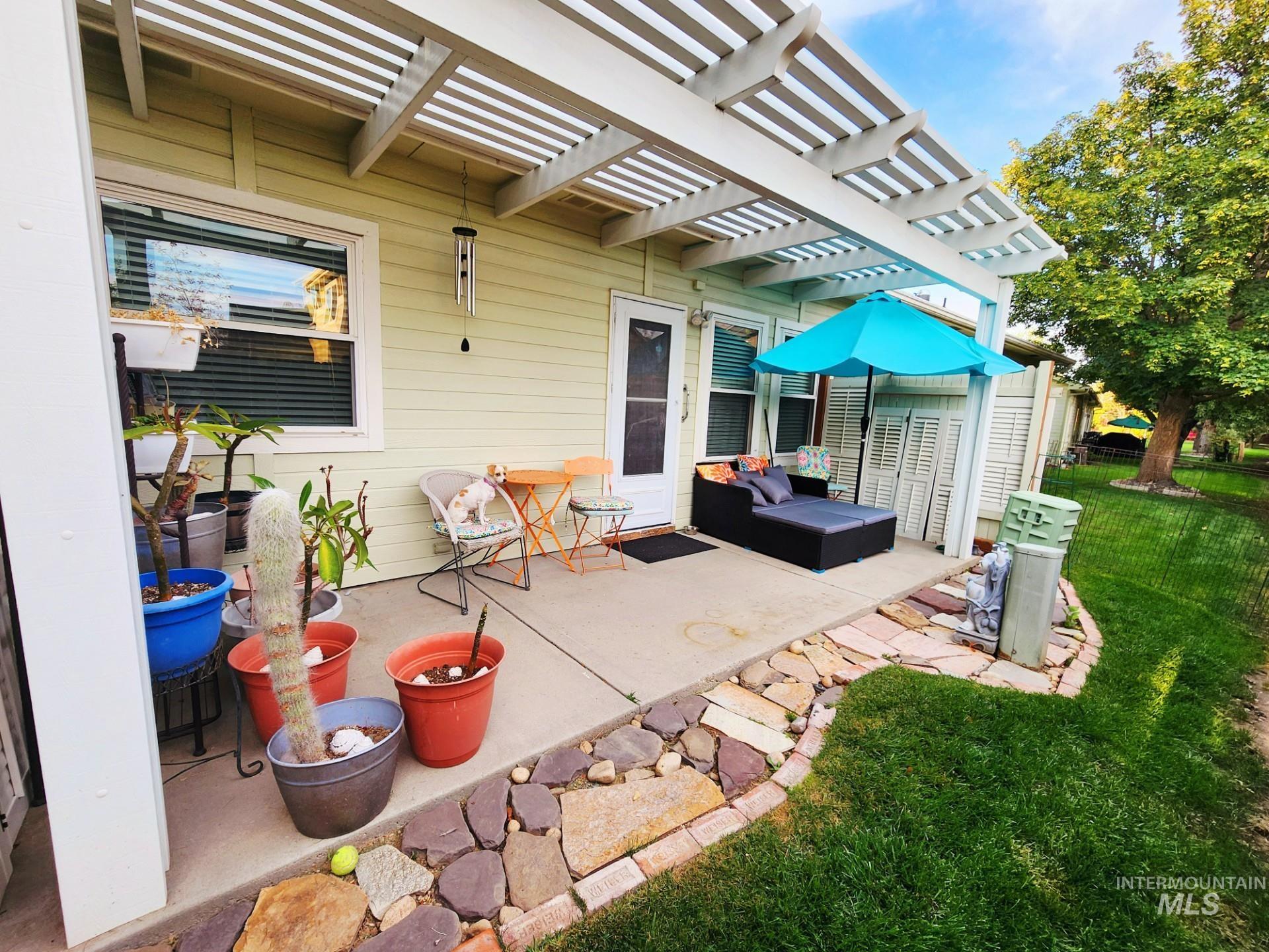 View of patio featuring a pergola