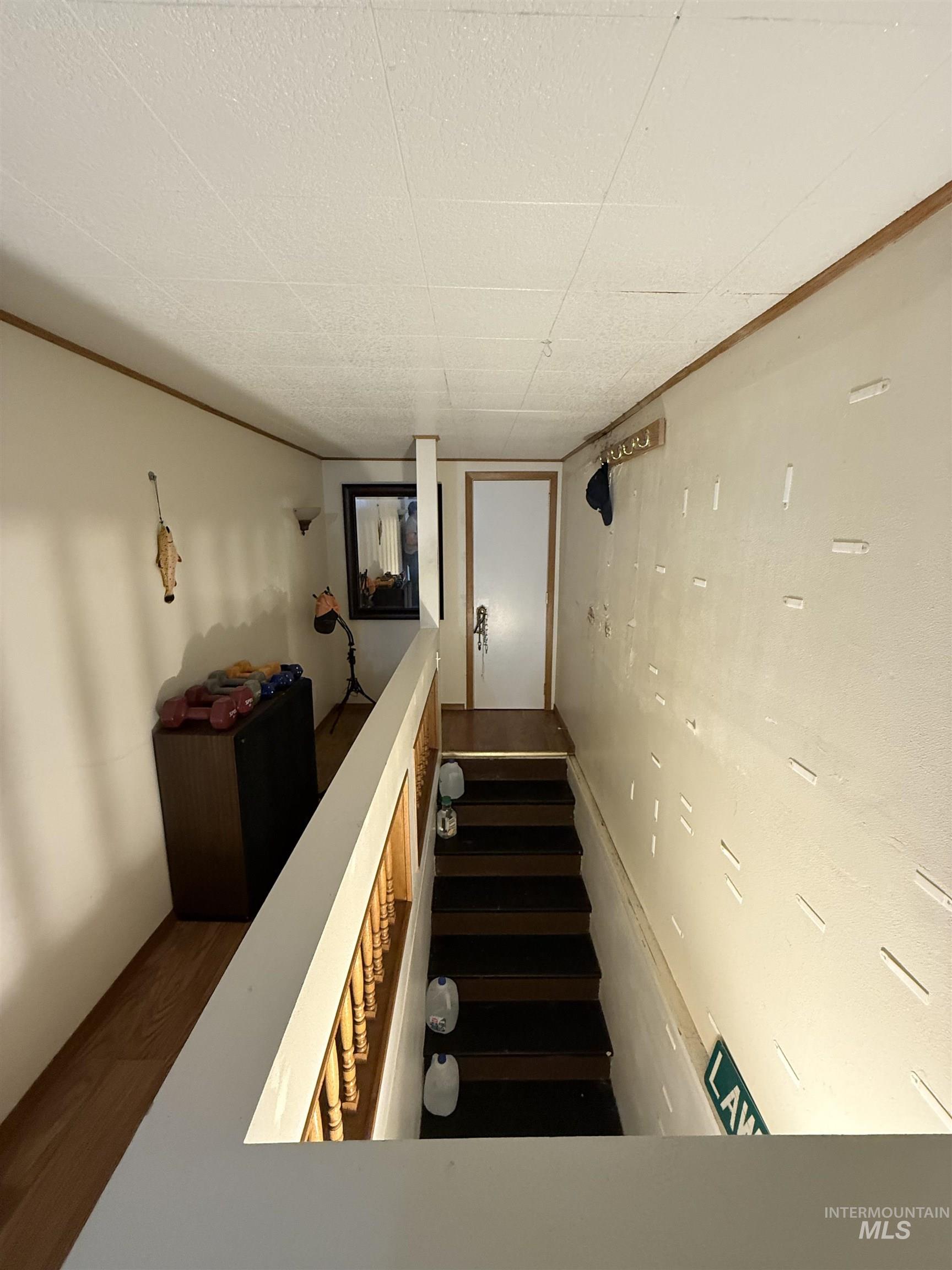 Staircase with wood finished floors