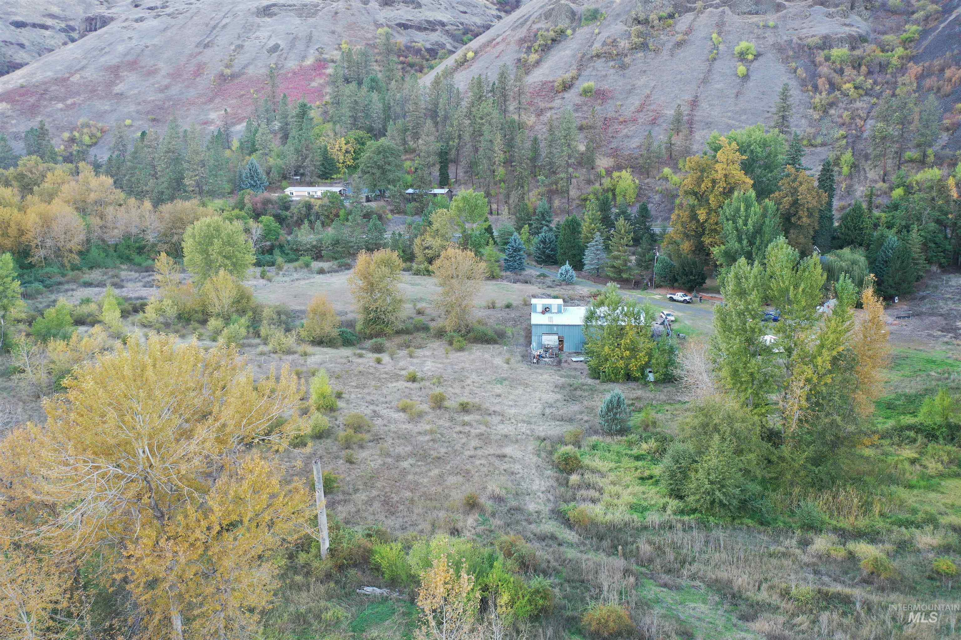 Aerial overview of property's location with a mountain backdrop
