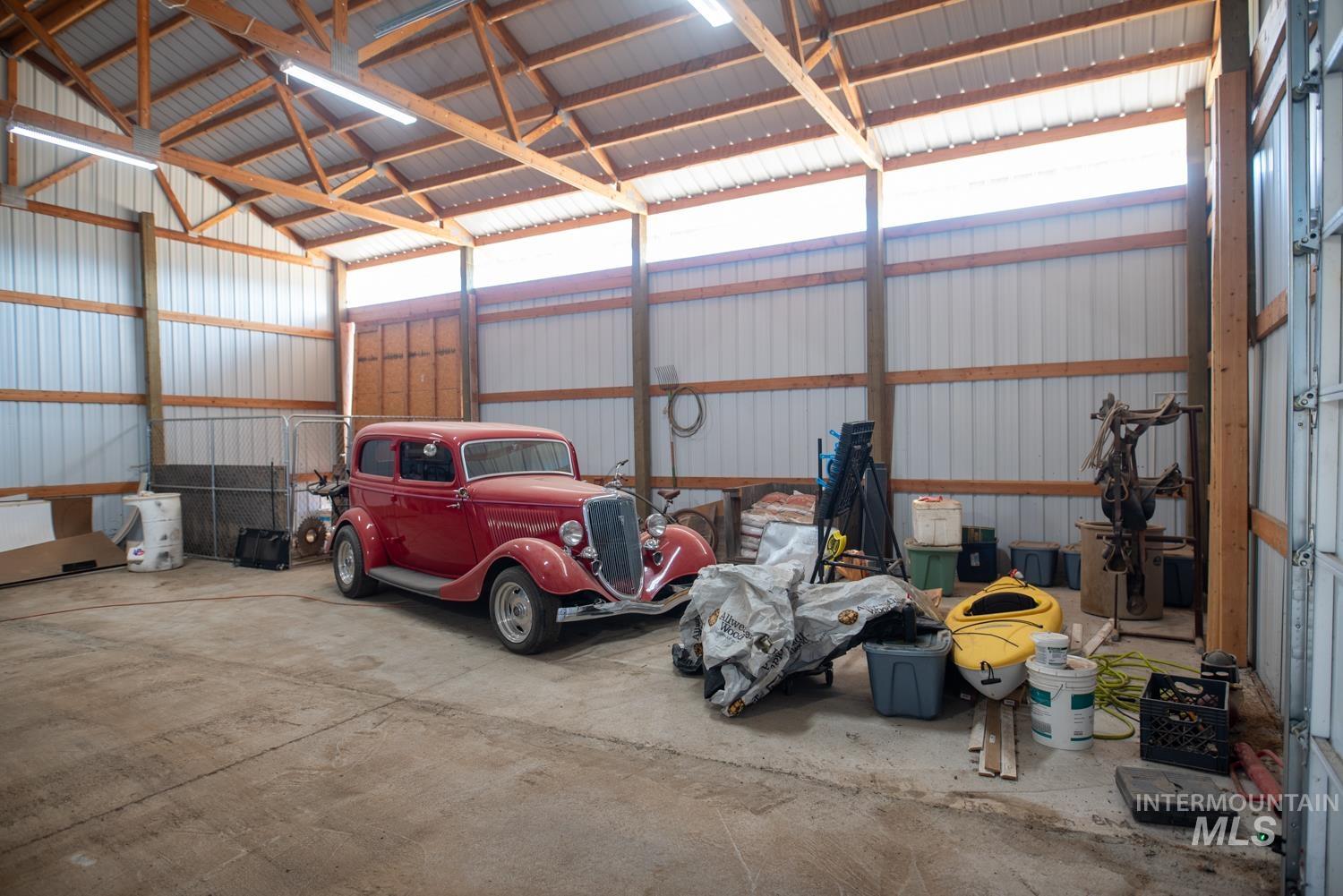 Garage featuring metal wall