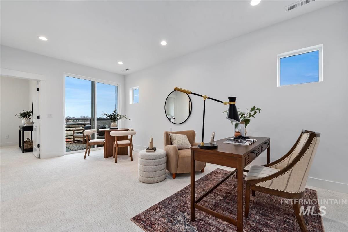 Office featuring carpet flooring and recessed lighting