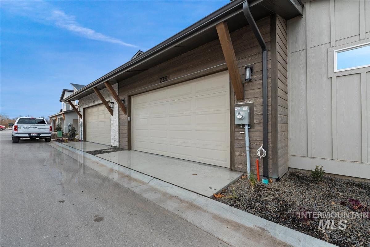 Garage featuring driveway