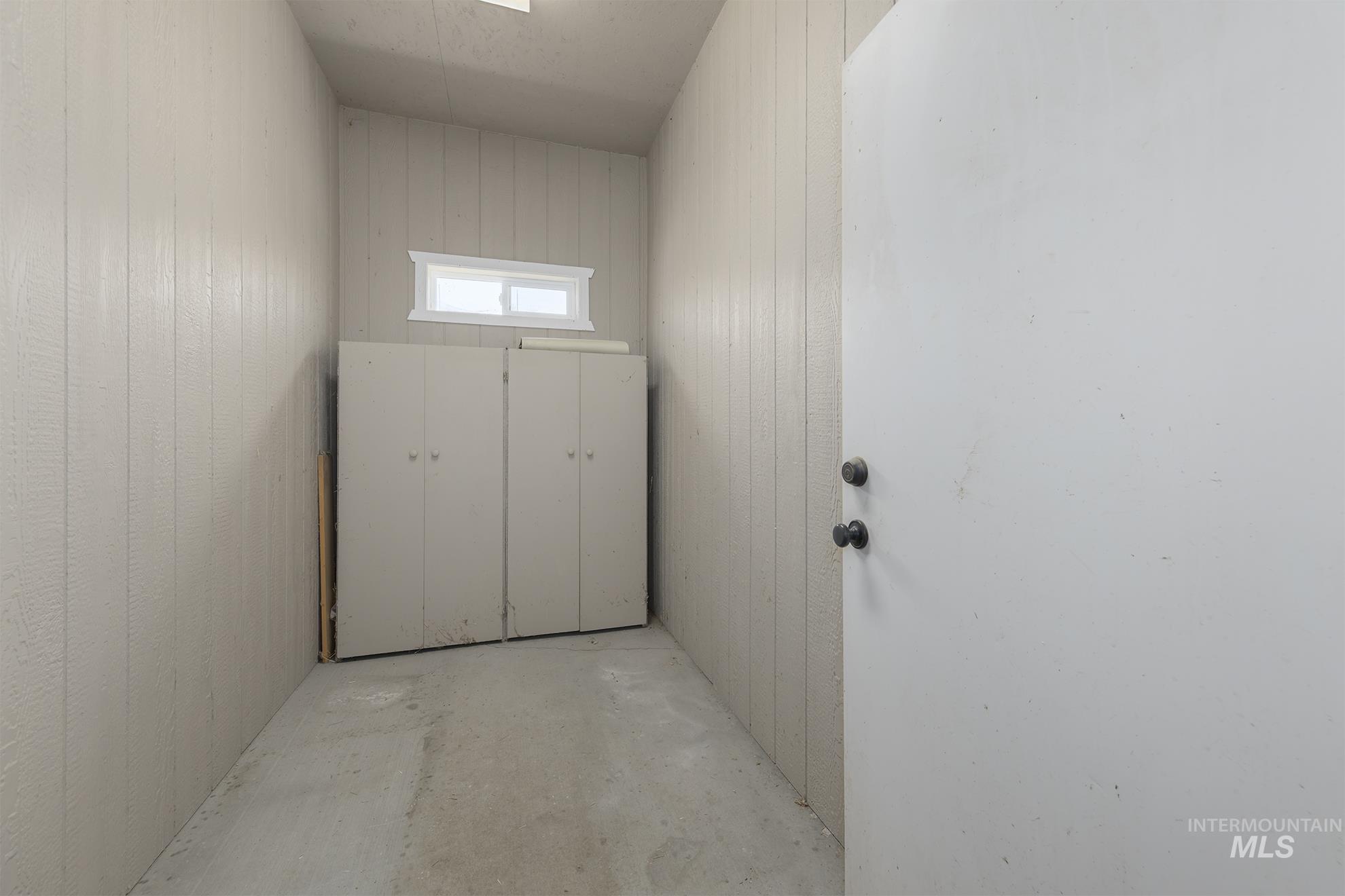 Doorway featuring concrete floors