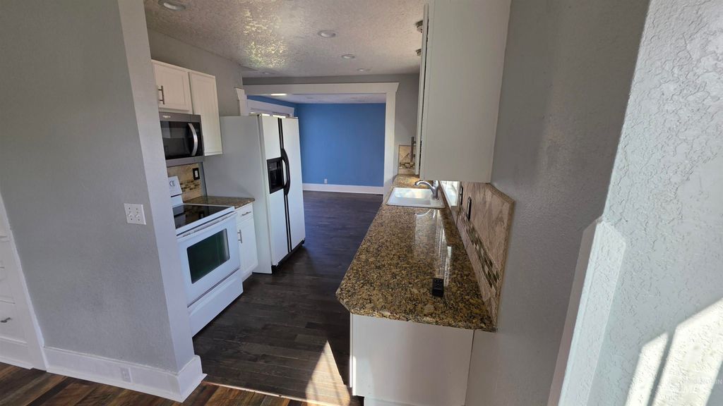 Photo of 613 8th St. S ST, Nampa, ID 83651 (MLS # 98984859)