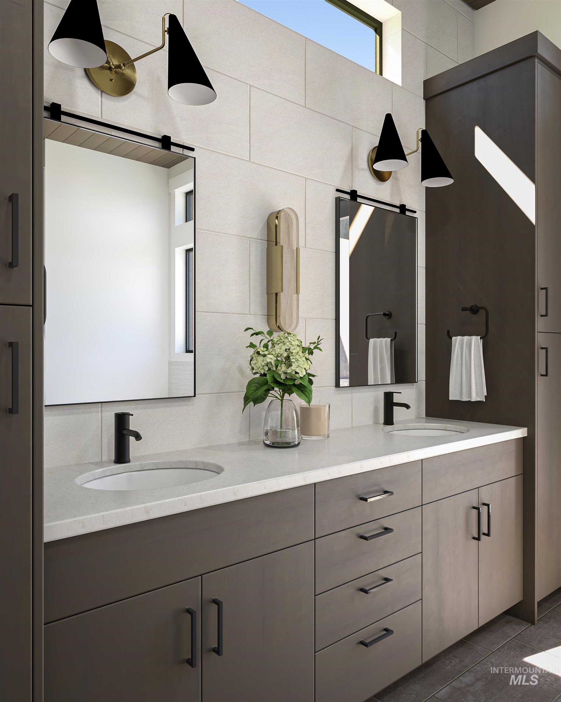 Digital Rendering. Dual vanity featuring matte gray cabinetry, a light-toned countertop, and undermount sinks