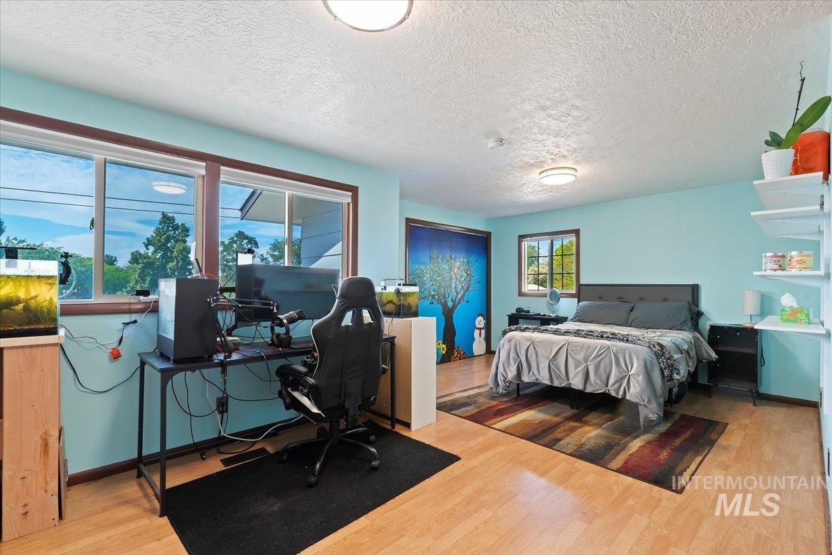 Bedroom across from stairway.