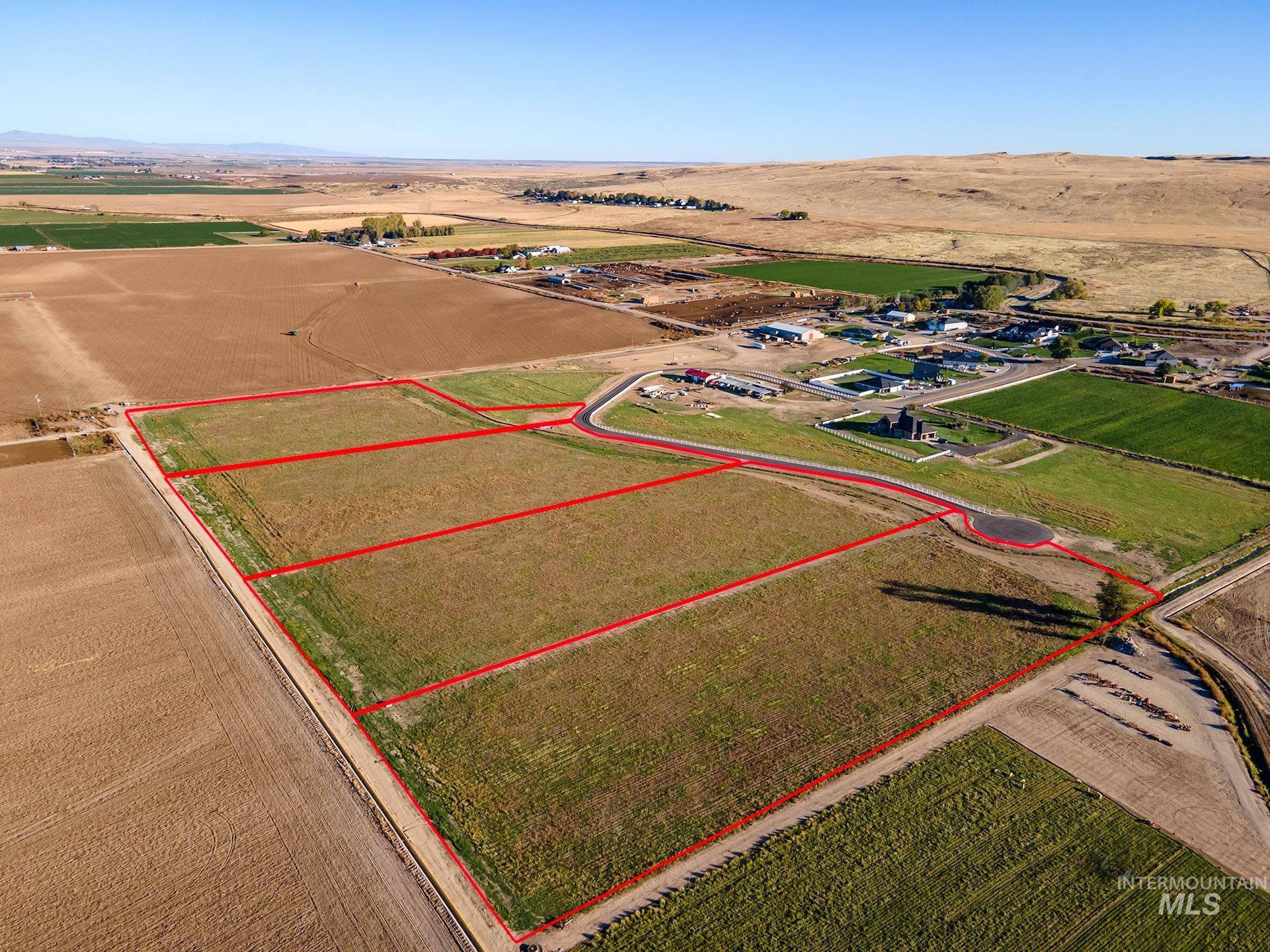 Overview of rural landscape with property boundaries highlighted and farmland