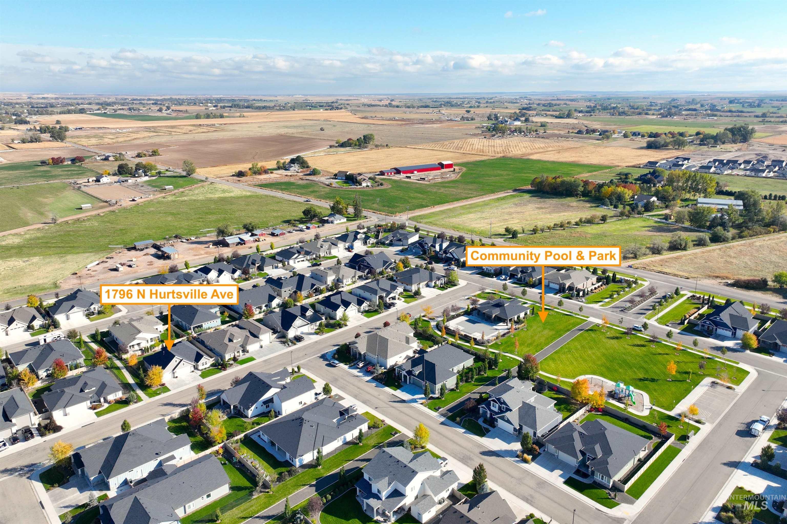 Aerial overview of property's location with nearby suburban area