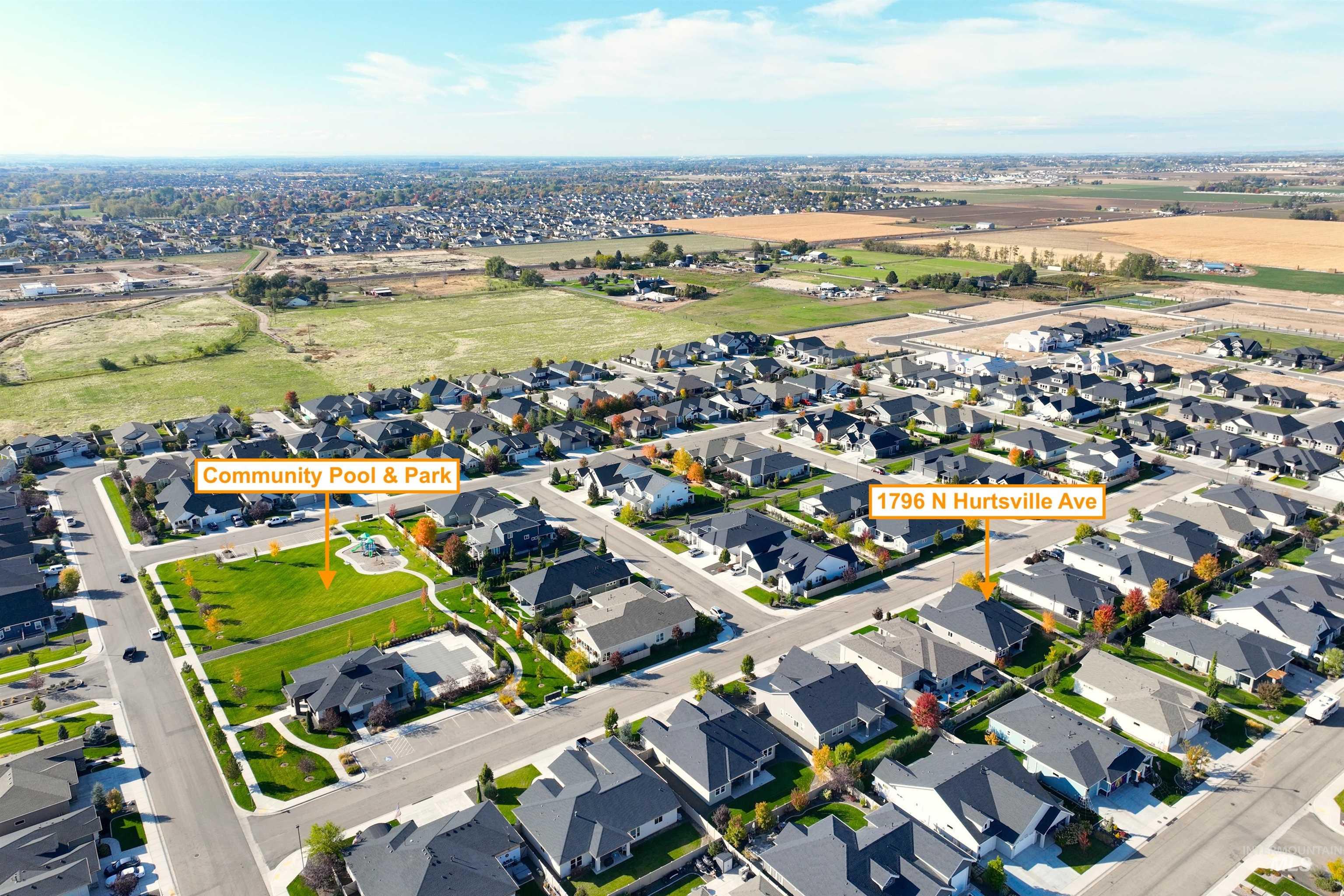 Aerial overview of property's location with nearby suburban area