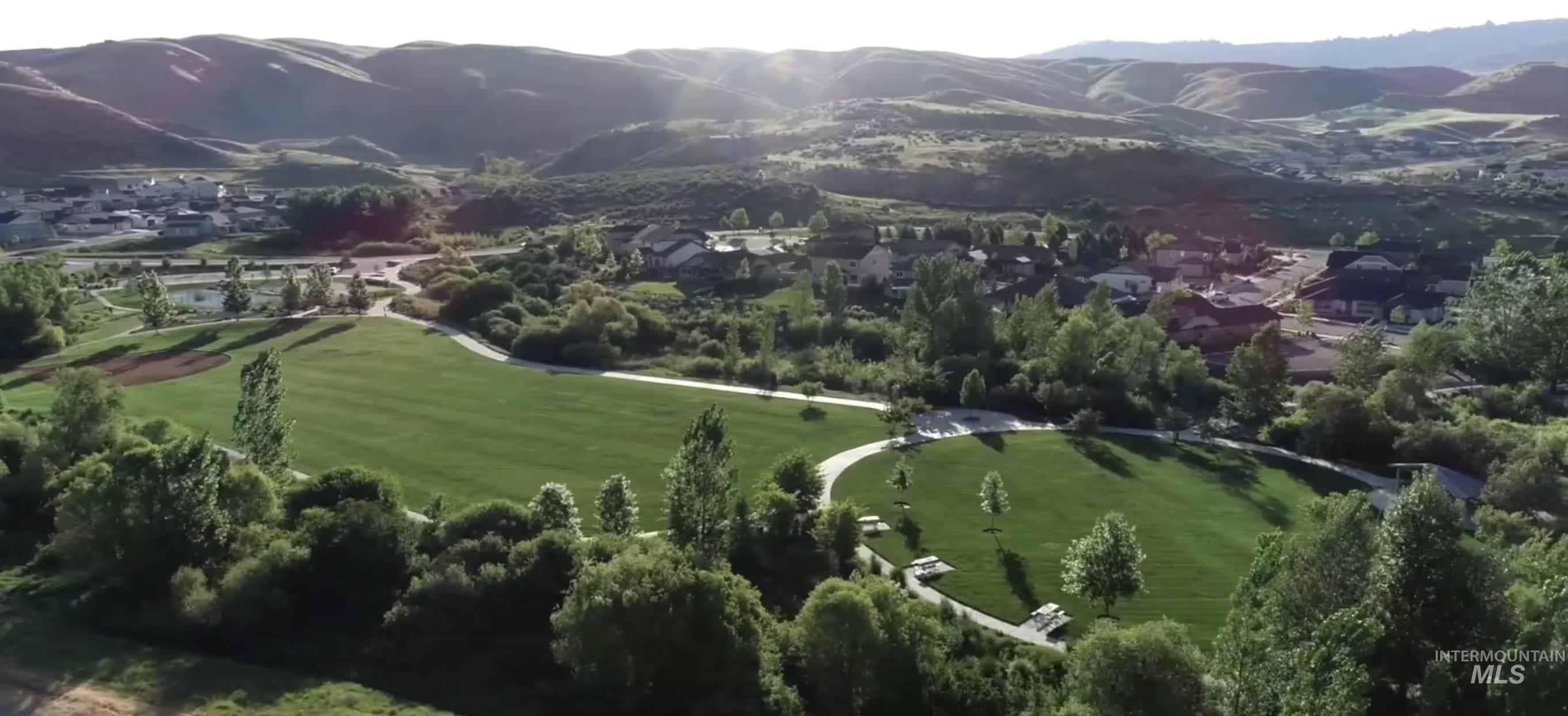 Aerial overview of property's location with mountains