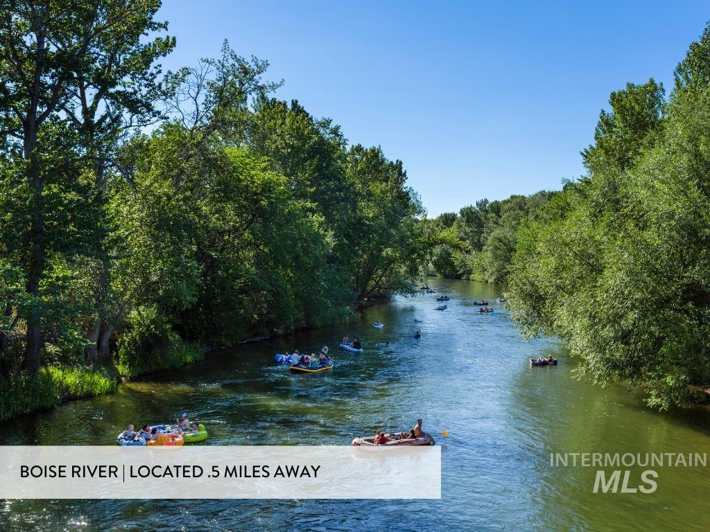 Water view featuring a heavily wooded area