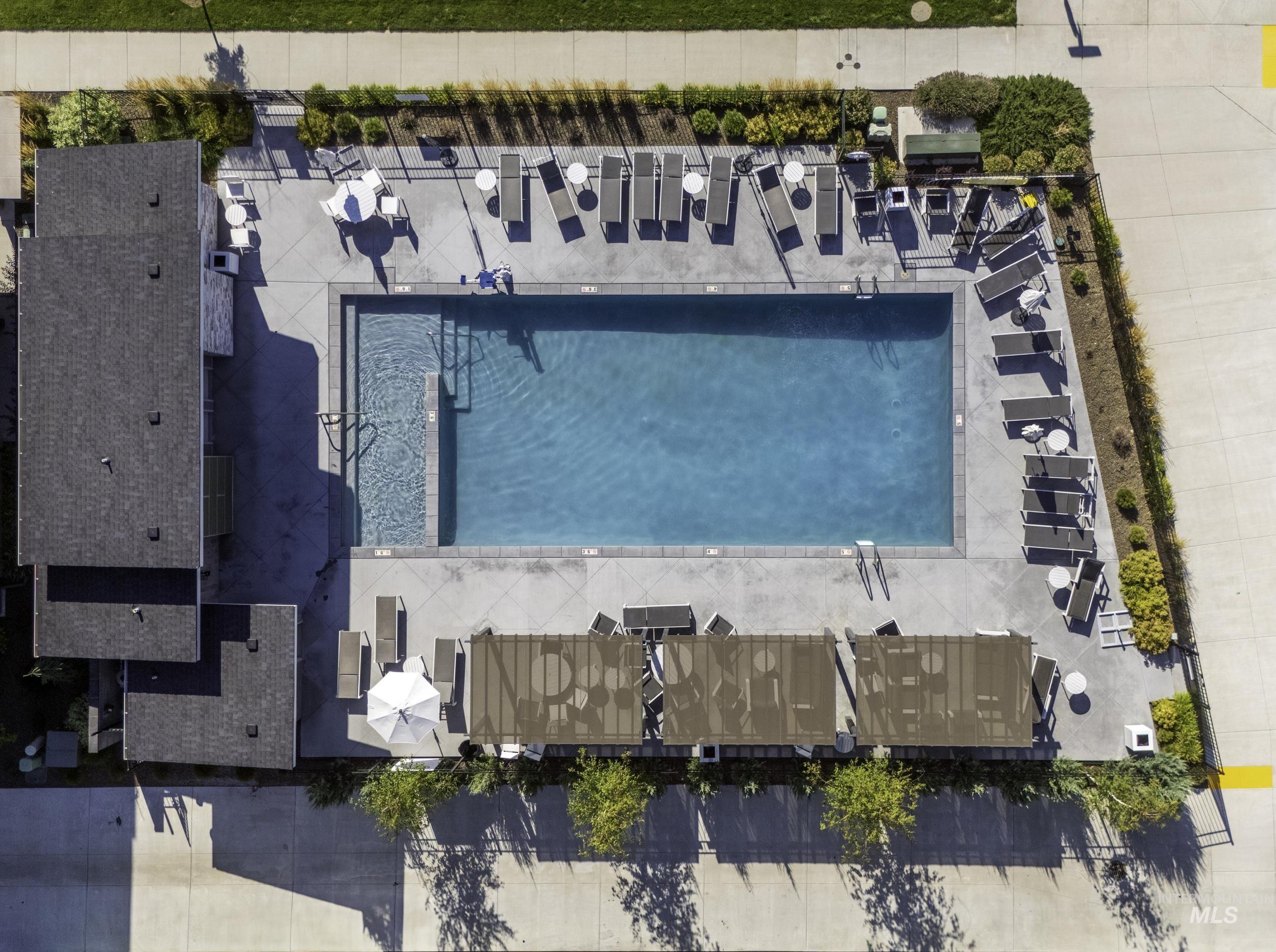 Drone / aerial view of a pool area