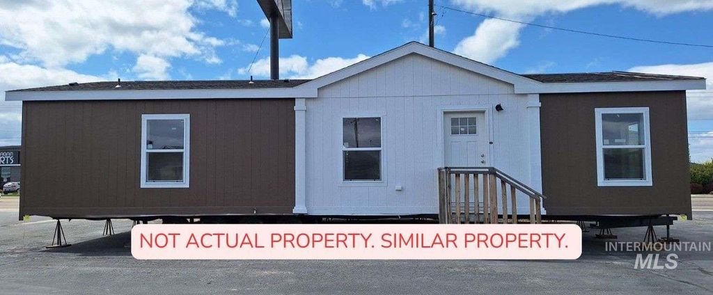 Photo of 265 W 9th, Mountain Home, ID 83647 (MLS # 98974328)