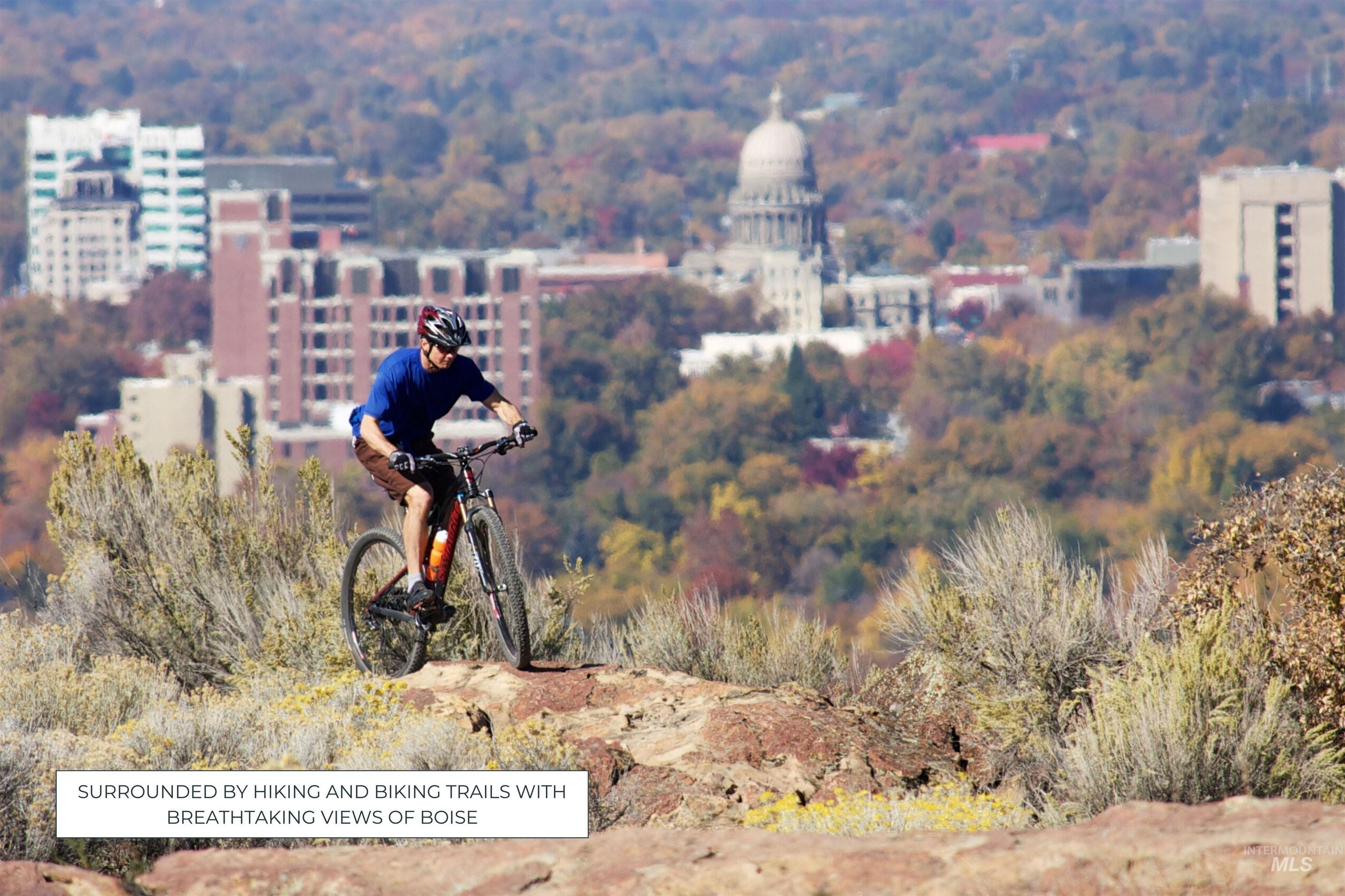 View of mountain backdrop featuring nearby urban area