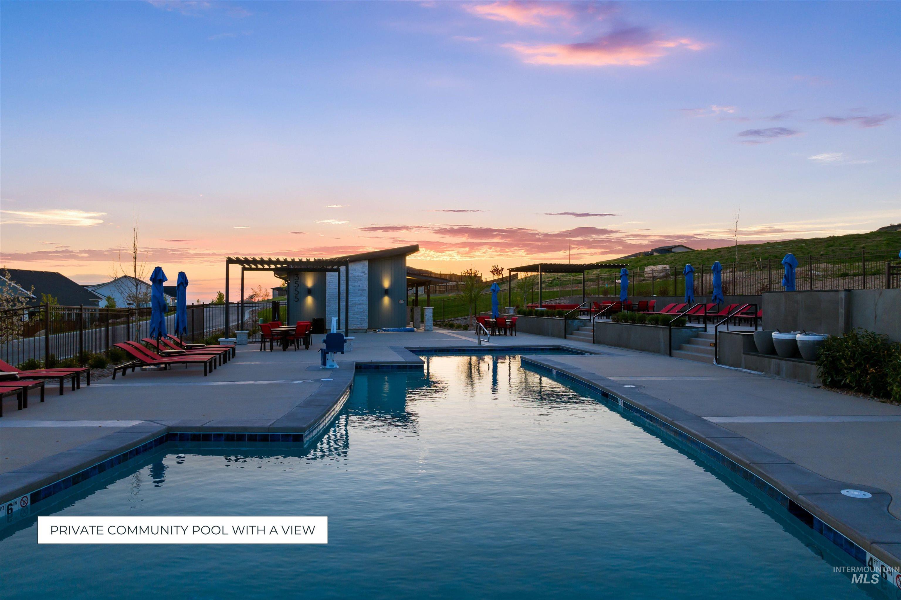 Community pool featuring a patio area