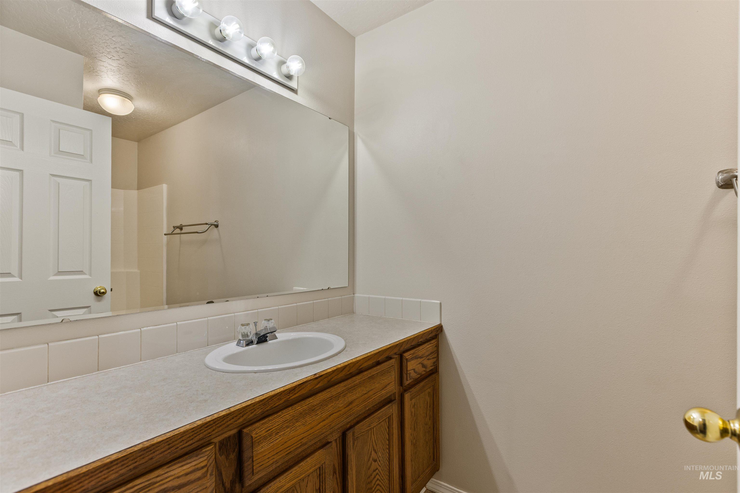 Bathroom featuring vanity